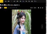 鞠婧祎边看剧本边吹风 头扎双马尾古灵精怪